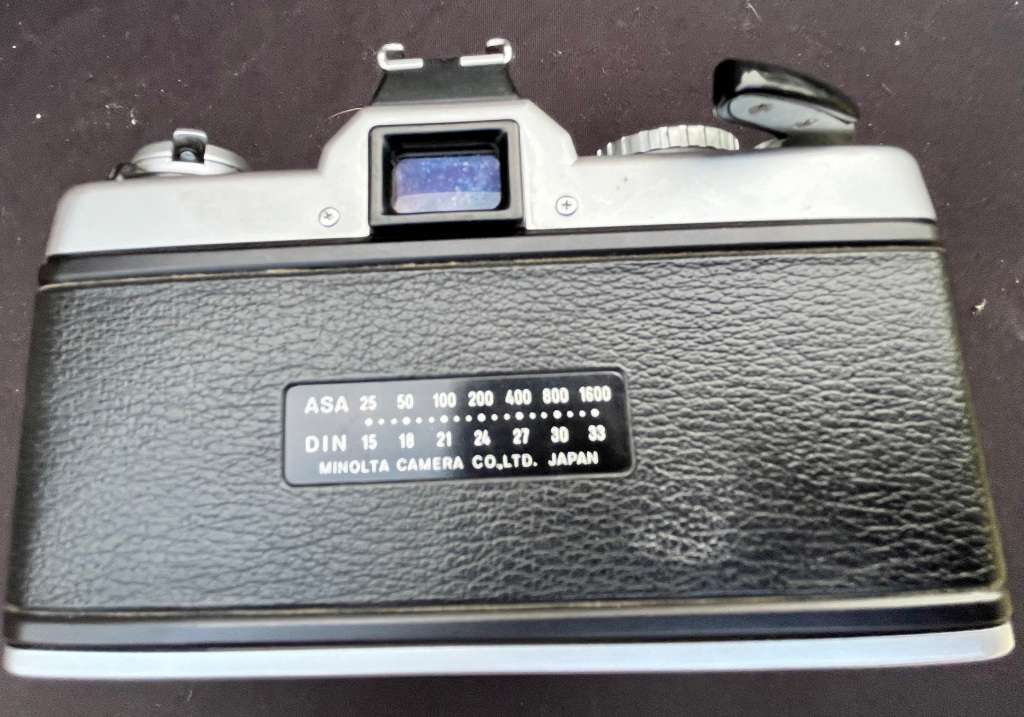 MAKINON zoom lense and MINOLTA film camera.