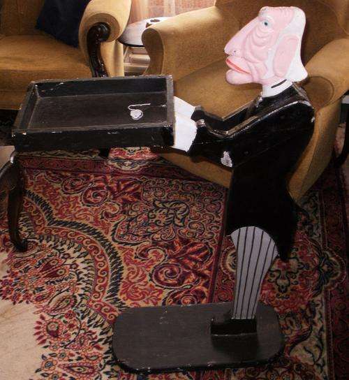 A STUNNING DUMB WAITER (MALE)