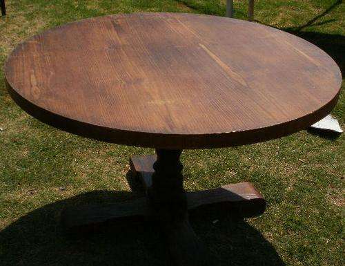 A ROUND SA PINE DARK STAINED TABLE