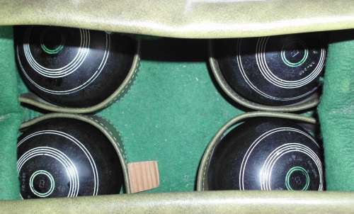 Bowling balls lawn size 4 + books/bag