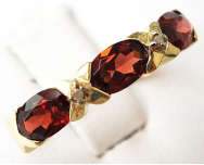 STUNNING 9CT SOLID YELLOW GOLD GARNET AND DIAMOND RING (INVEST NOW IN GOLD)