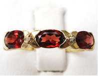 STUNNING 9CT SOLID YELLOW GOLD GARNET AND DIAMOND RING (INVEST NOW IN GOLD)