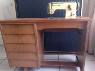 Bernina Model 740 Sewing Machine with cabinet and accessories , good condition, recently serviced