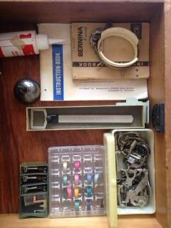 Bernina Model 740 Sewing Machine with cabinet and accessories , good condition, recently serviced