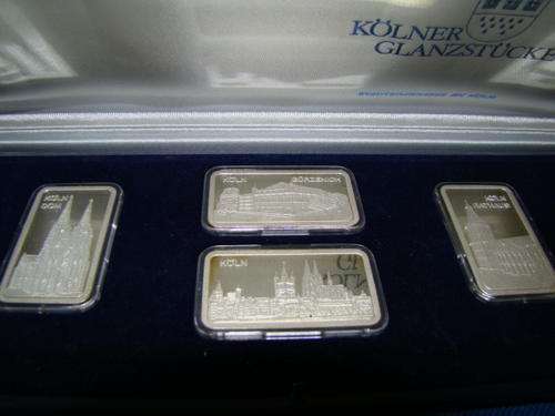 Four 1 ounces of pure silver proof bars