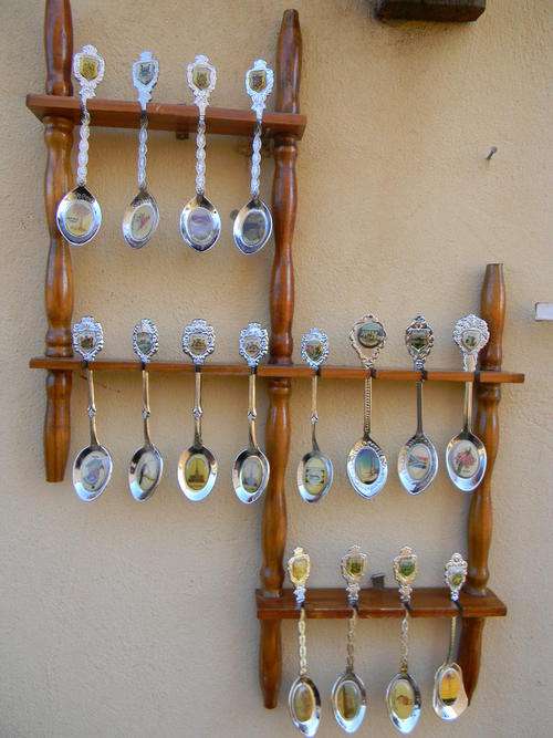 Wow 16 Stunning assortment souvenir spoons of SA with inlays and free rack.