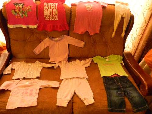 11 Pieces of Baby girl clothes. From 0-3 months to 6-12 months. In excellent condition