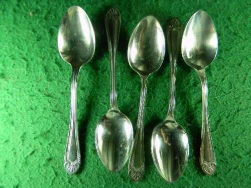 set of 5 sipelia rustles nickel silver spoons Sheffield show small brown spot in spoon