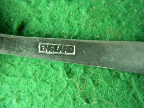 Voortrekker Monument show wear and marks in spoon (England)