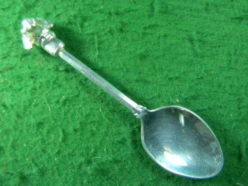 Face off on dog in silver plated good condition