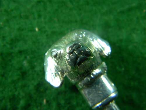 Face off on dog in silver plated good condition
