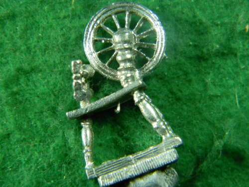 Old Spinning wheel silver plated in good condition