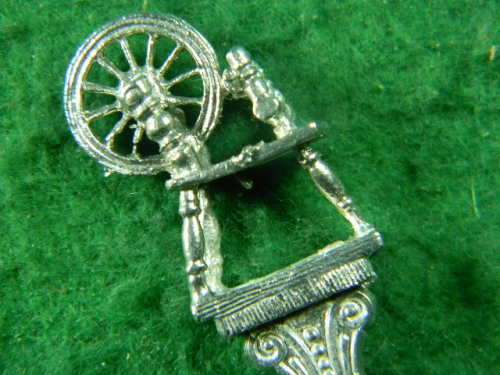 Old Spinning wheel silver plated in good condition