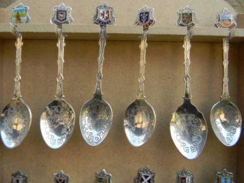 18 Vintage International spoons as per pictures silver plated  in good condition
