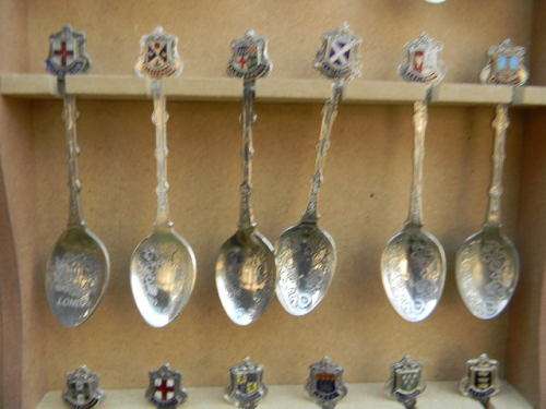 18 Vintage International spoons as per pictures silver plated  in good condition