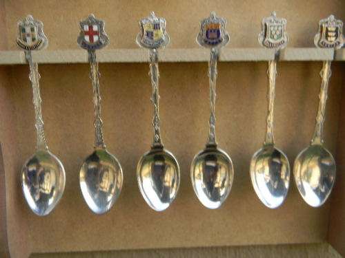 18 Vintage International spoons as per pictures silver plated  in good condition