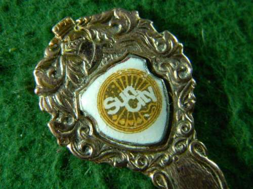 Sun City copper spoon in fair condition