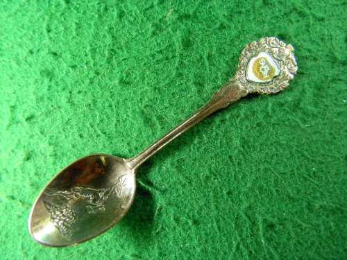 Sun City copper spoon in fair condition