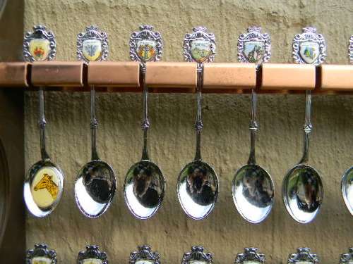 36 Souvenir spoons in good condition from South africa with free rack