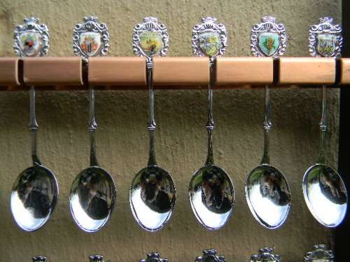 36 Souvenir spoons in good condition from South africa with free rack