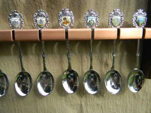 36 Souvenir spoons in good condition from South africa with free rack