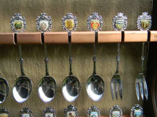 36 Souvenir spoons in good condition from South africa with free rack