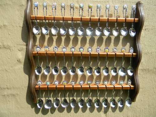 .36 souvenir Spoons off South Africa in good condition with free rack.