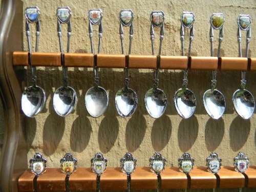 .36 souvenir Spoons off South Africa in good condition with free rack.