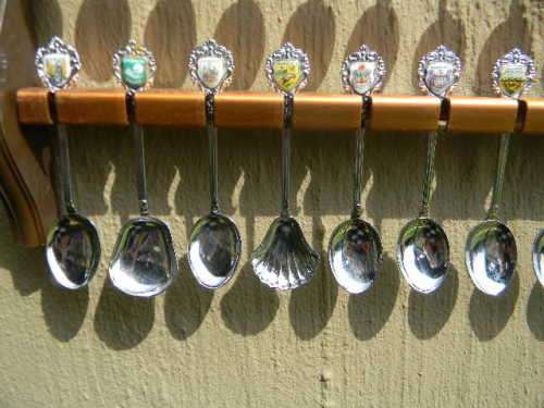 .36 souvenir Spoons off South Africa in good condition with free rack.