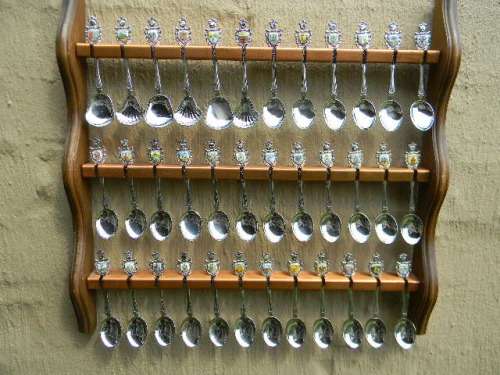 36 Souvenir spoons from South Africa in good condition with free rack
