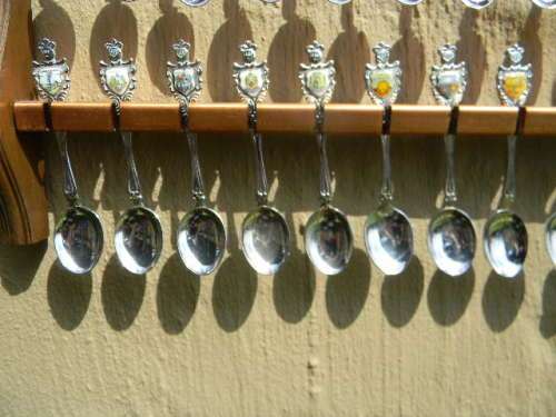 36 Souvenir spoons from South Africa in good condition with free rack
