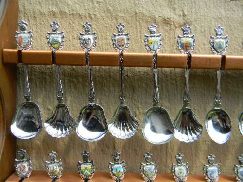 36 Souvenir spoons from South Africa in good condition with free rack