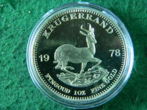 Kruger rand 1978 1 oz Fine gold coin gold plated not solid gold in plastic holder