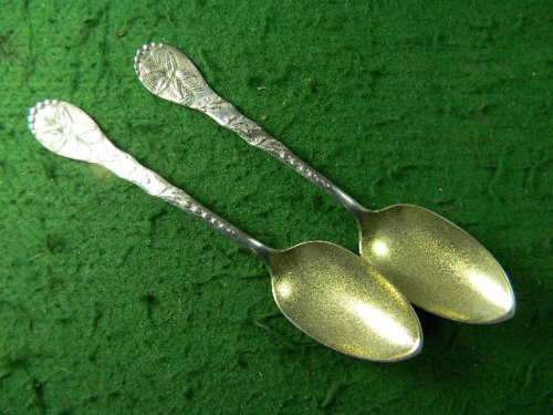 2 very oldflower spoons with an crab at back brass and silver plated as per pictures