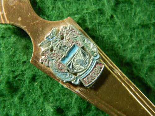 Kariba spoon yellow copper plated  in fair  condition  As per pictures