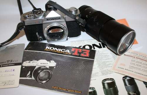 Konica Autoreflex T3 with Vivitar 200mm 3.5 Lens (lens needs cleaning) includes Instruction Book