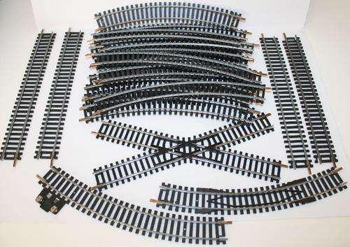 Lima Tracks-Like New-One 36deg Crossing-One Rerailer-One Power Track-16 Curves-4 Staights.