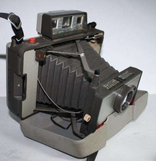 Polaroid Automatic 220 Land Camera with Instruction Booklet.