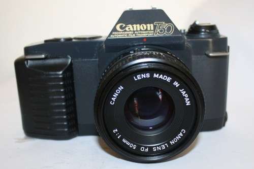 Canon T50- SLR 35mm Camera with Canon FD 50mm f2 Lens.