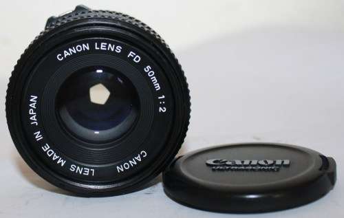 Canon T50- SLR 35mm Camera with Canon FD 50mm f2 Lens.