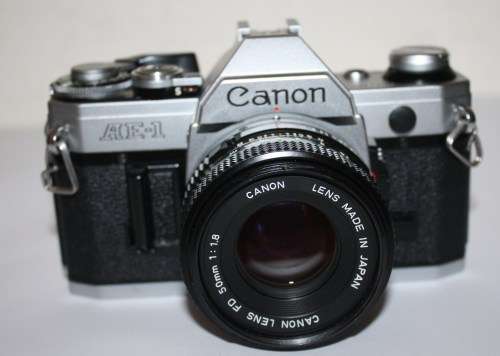 Chrome Canon AE-1..35mm S.L.R. Camera FD 1.8 50mm Lens-All Working Well.