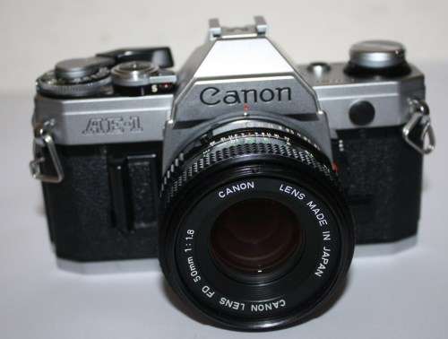 Chrome Canon AE-1..35mm S.L.R. Camera FD 1.8 50mm Lens-All Working Well.