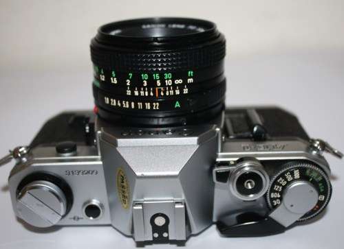 Chrome Canon AE-1..35mm S.L.R. Camera FD 1.8 50mm Lens-All Working Well.