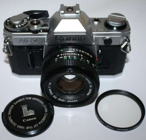 Chrome Canon AE-1..35mm S.L.R. Camera FD 1.8 50mm Lens-All Working Well.