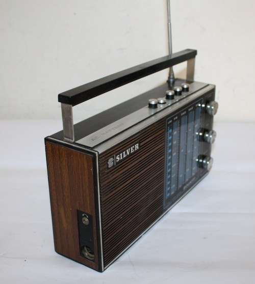 Silver Bounty ....Solid State 4 Band Radio....Working..As per Photos...260mm across..Antenna damaged