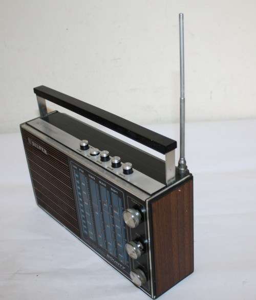 Silver Bounty ....Solid State 4 Band Radio....Working..As per Photos...260mm across..Antenna damaged