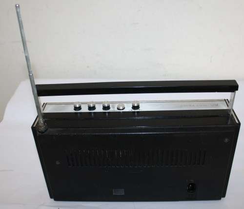 Silver Bounty ....Solid State 4 Band Radio....Working..As per Photos...260mm across..Antenna damaged