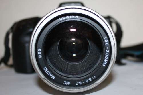 Minolta 500si*Super* with *Cosina*100-300mm Macro 5.6-6.7 Lens.