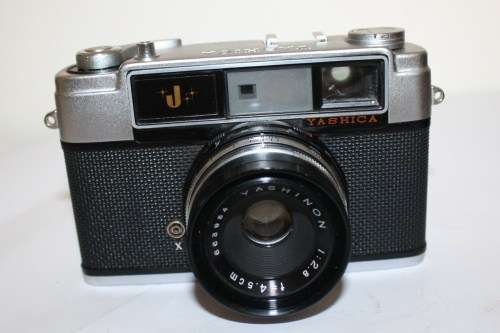Yashica *J* 35mm Camera....Shutter Fires...Good Cosmetic Condition