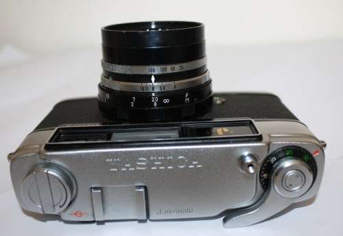 Yashica *J* 35mm Camera....Shutter Fires...Good Cosmetic Condition